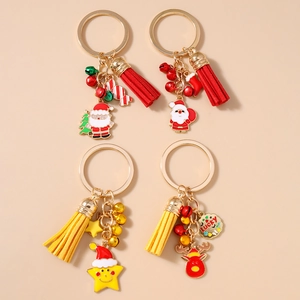 Christmas keychain set with Santa, reindeer and star charms plus colorful tassels