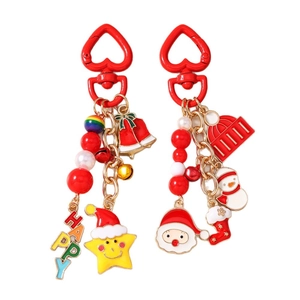Christmas beaded keychain with Santa, bells, and red heart clip for festive bag charms