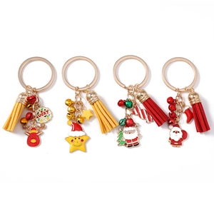 Christmas keychain set with reindeer, Santa, star pendants and colorful tassels