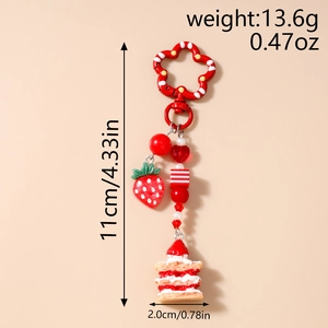 Detail view of strawberry cake keychain showing size measurements 11cm by 2.0cm