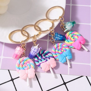 Set of four colorful lollipop and mini drink cup keychains with macaron bows