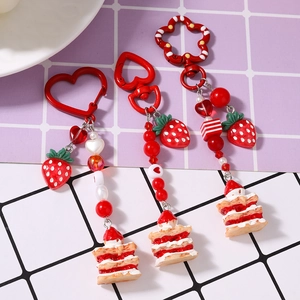 Three-piece strawberry cake keychain set with heart beads and red resin charms