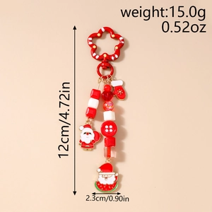 Detail view of Christmas keychain with Santa charm and red beads showing precise dimensions
