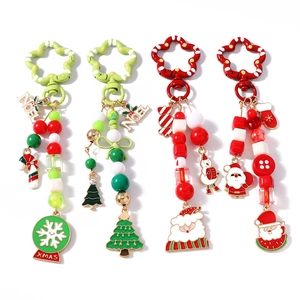 Christmas beaded keychains with Santa, Xmas tree, snowflake and candy cane pendants