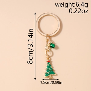 Détail d'un porte-clés sapin de Noël avec clochette verte et dimensions affichées de 8cm