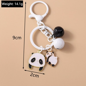 Détails du porte-clés panda avec dimensions et informations sur le poids sur fond kaki