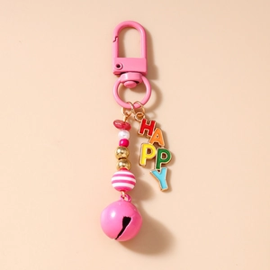 Detail of beaded HAPPY keychain with pink bell, enamel letters, and lobster clasp