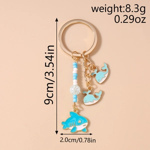 Marine whale and shark keychain with blue beads and golden metal ring dimensions detail