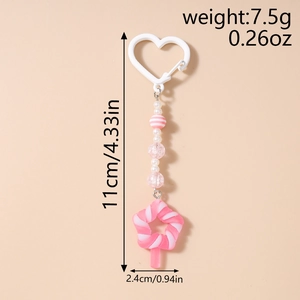 Detail view of beaded keychain with pink star pendant and size dimensions listed