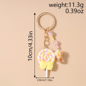 Detailed view of dessert lollipop keychain with dimensions 11.3g and 10cm height