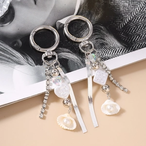 Elegant beaded keychain with snake chain, rhinestone fringe, and shell pearl pendants