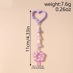 Detail showing weight 7.6g and size 11cm dimensions for purple heart star keychain