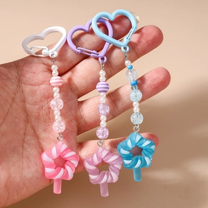 Colorful heart beaded keychain with star candy pendant in pink, purple, and blue tones