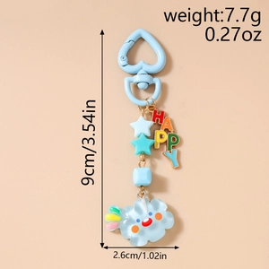 Vue détaillée du porte-clés nuage bleu avec arc-en-ciel et perles colorées Happy