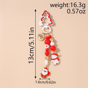 Detailed view of Christmas snowman keychain with colorful beads and white tree clasp