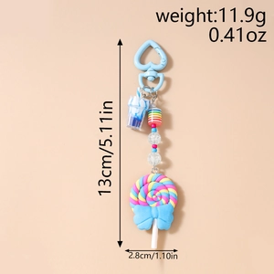 Detailed view showing dimensions and weight of colorful clay lollipop keychain pendant