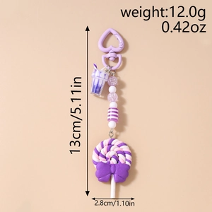 Detailed view of purple bead keychain with lollipop charm and dimensions info