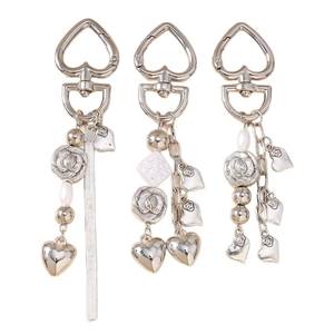 Three-piece silver heart keychain set with pearls and rose flower charms for bags