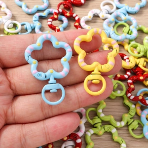 Creative floral spring keychains with colorful polka dot patterns and swivel ring hooks