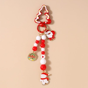 Christmas keychain with red beads, Santa and snowman charms and a Lucky round plate