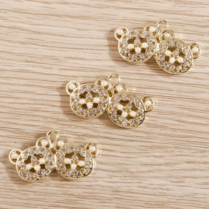 Three golden hollow bear pendants with pearls and rhinestones for DIY jewelry making