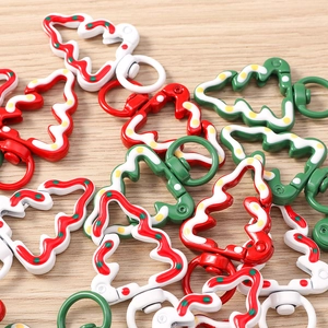 Detail view of Christmas tree lobster clasps in red, green and white festive colors