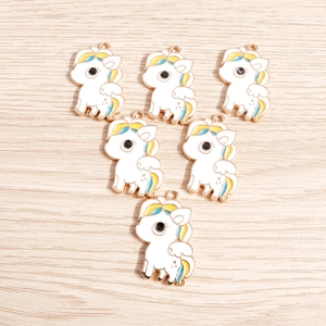 Set of six white unicorn metal charms with colorful wings for DIY jewelry making