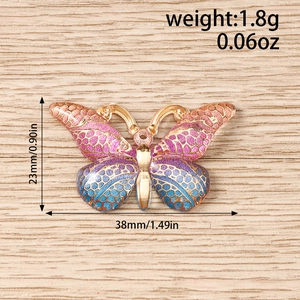 Detailed dimensions of a golden butterfly pendant with pink and blue enamel texture