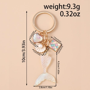 Detailed view of mermaid tail keychain with size specifications and iridescent pendants