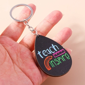 Handheld wooden teardrop keychain for teachers with teach and inspire text designs