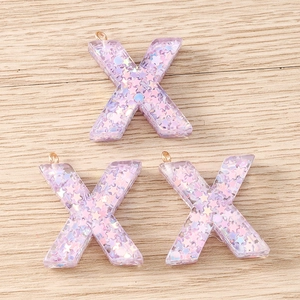 Sparkly purple resin letter X pendants with sequins for DIY jewelry and necklaces