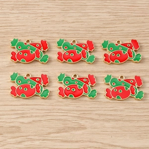 Detailed view of red and green enamel candy pendants for Christmas DIY jewelry making