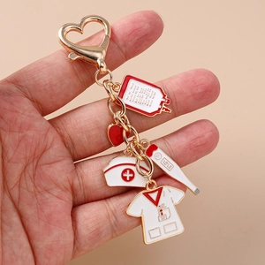 Nurse medical keychain with heart clip, thermometer, uniform and blood bag charms