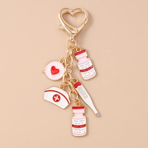 Detail of creative medical keychain with heart clip, nurse hat and medicine bottle charms