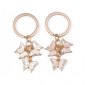 Ensembles porte-clés papillon tendance en émail blanc et rose avec anneaux dorés