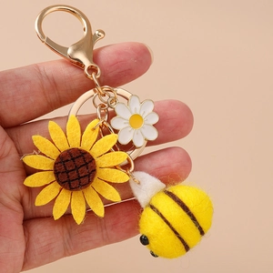 Portachiavi in peluche girasole e ape con ciondolo a margherita e chiusura dorata