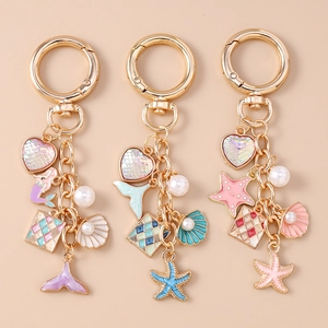 Fashion Ocean Theme Metal Keychain Mermaid Tail Shell Starfish Heart Artificial Pearl Charms Bag Hanging Ornament For Women Girls