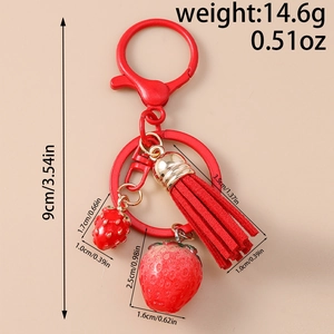 Detailed view of red strawberry keychain with dimensions, weight and fiber tassel