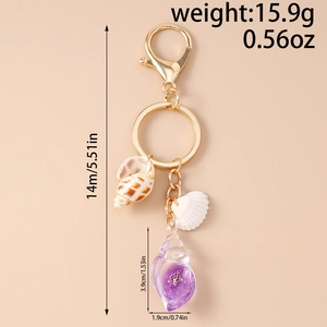 Detail view of beach shell keychain with size dimensions and 15.9g weight specs