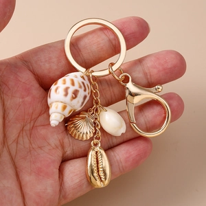 Porte-clés bohème thème océan avec coquillages naturels et charms étoile de mer dorés