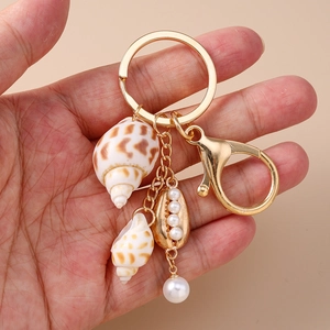 Porte-clés coquillage doré avec perles et breloques de plage pour sacs d'été