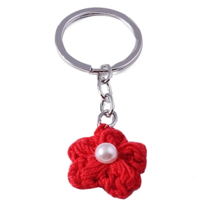 Handmade red crochet flower keychain with pearl center and silver metal ring accessory