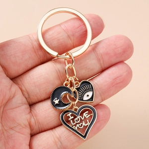 Fashion heart and eye charms keychain with I Love You engraving in gold finish
