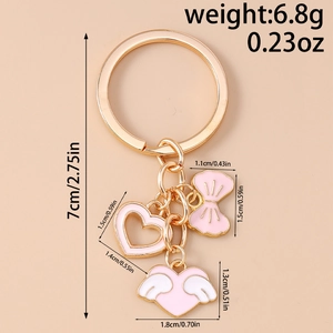 Detailed dimension guide for pink enamel heart and bow gold keychain charms, 6.8g weight