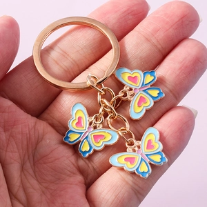 Portachiavi con ciondolo a farfalla colorato alla moda con anello dorato per borse