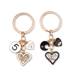 Fashion heart keychains set with evil eye and I LOVE YOU engraving in black and white