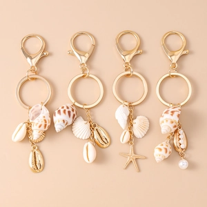 Porte-clés de Plage d'été Coquillage Étoile de Mer pour Femmes Boho Alliage d'or Conque Naturelle Künstliche Perle Pendentif Sac