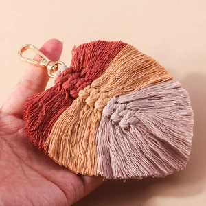 Handmade macrame leaf keychain with colorful cotton woven design and golden metal lobster clasp