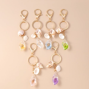 Creative glowing shell and conch keychains in six colors with gold hardware