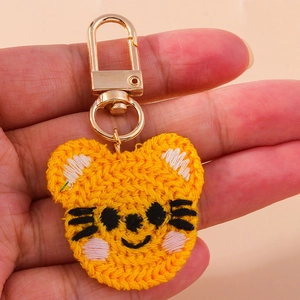 Porte-clés tigre fait main au crochet en fil jaune avec fermoir en métal doré
